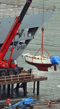 The yacht belonging to Paul and Rachel Chandler being unloaded at Portland Port in Dorset