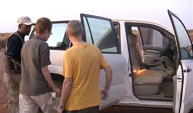 Paul and Rachel board climb into a vehicle last week as their nightmare nears its end in dramatic dawn hand over to ex-cabbie Dahir